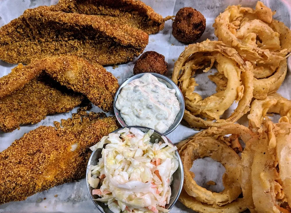 Fried Fish Hand- Battered Onion Rings Homemade Cole Slaw and Tarter Sauce